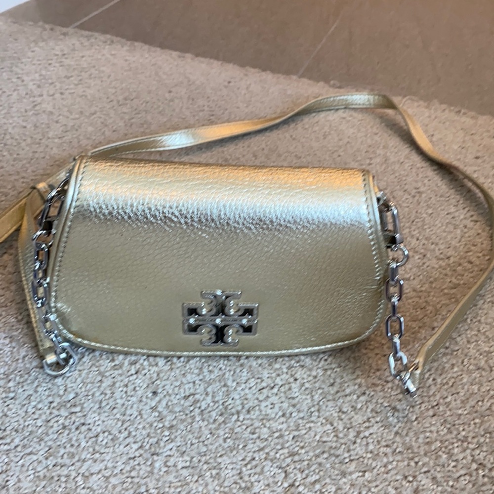 Gold Tory Burch cross body purse